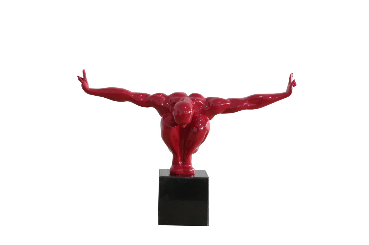 Escultura de hombre tendido