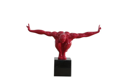 Escultura de hombre tendido