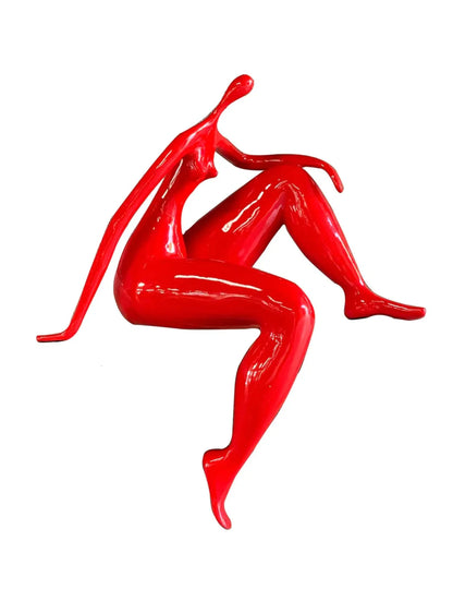 Escultura de persona sentada y relajada